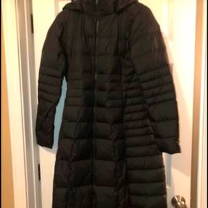 Worn once! Women’s long north face black jacket!